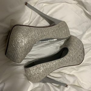 Paprika high heels silver in good condition size 6 woman